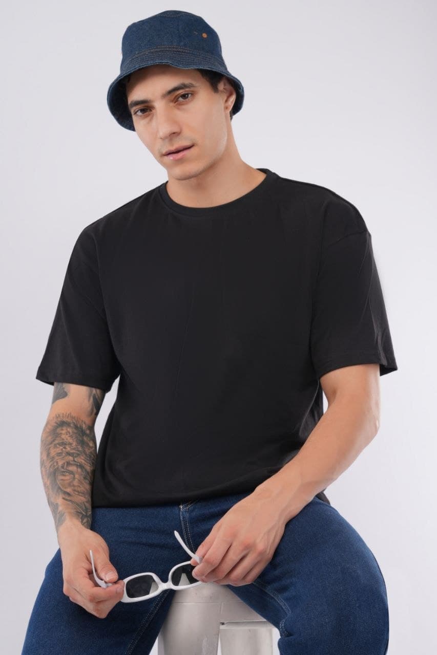 Black oversized tshirt made with 220 GSM combed cotton — lifestyle