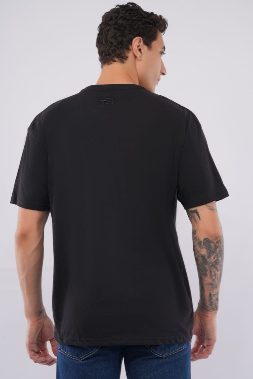 Black oversized tshirt made with 220 GSM combed cotton — lifestyle