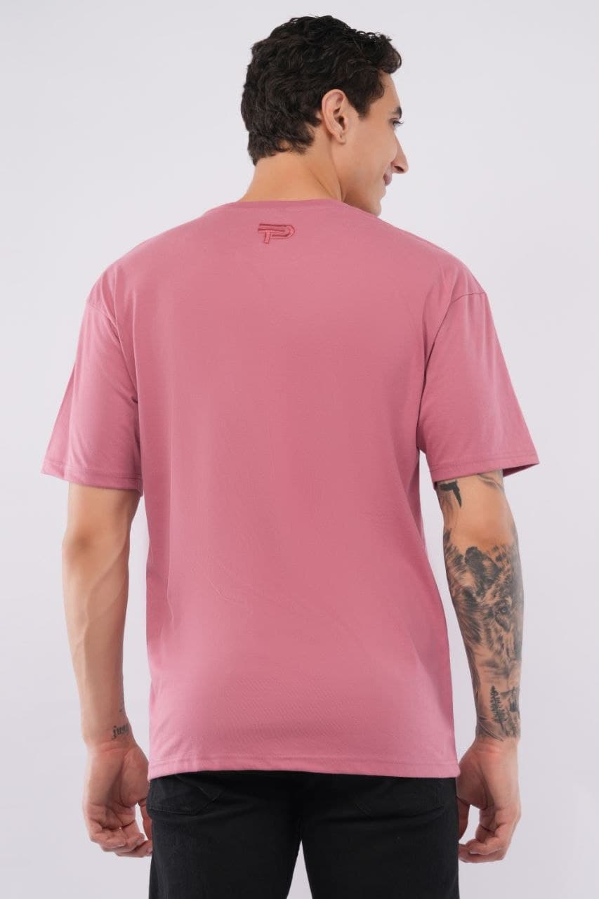 Pink oversized tshirt made with 220 GSM combed cotton — lifestyle
