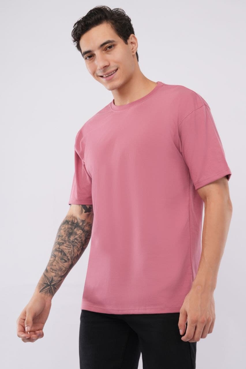 Pink oversized tshirt made with 220 GSM combed cotton — lifestyle