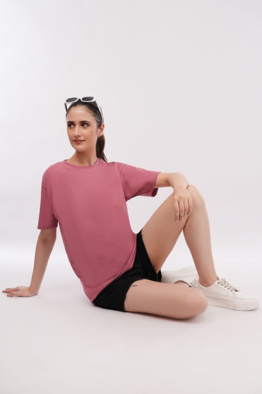 Pink oversized tshirt made with 220 GSM combed cotton — lifestyle