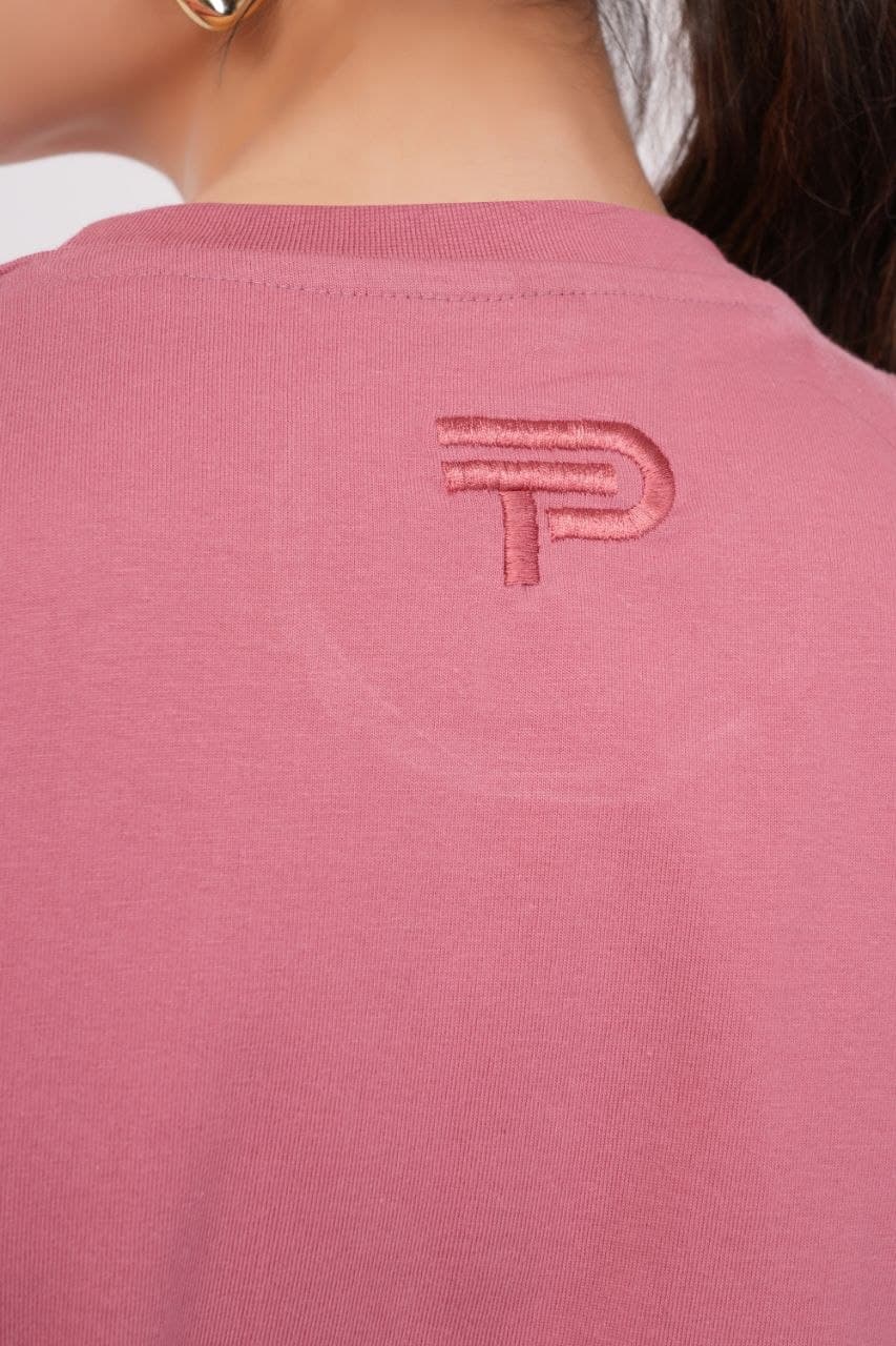 Pink oversized tshirt made with 220 GSM combed cotton — lifestyle