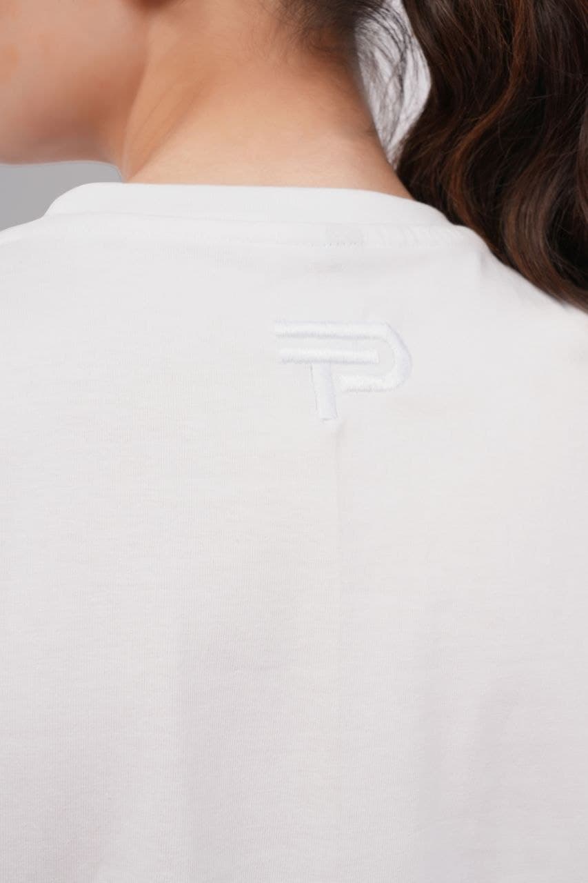 White oversized tshirt made with 220 GSM combed cotton — lifestyle